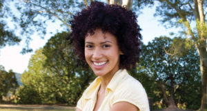 Woman smiling outside